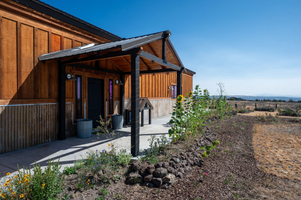 Front door and patio cover the the barndominium
