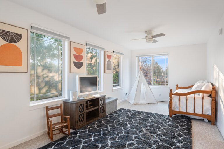 Bright and inviting regular bedroom with modern decor.
